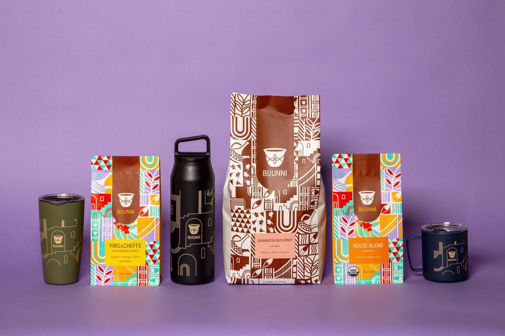 A row of Buunni coffee bags and cups of different sizes